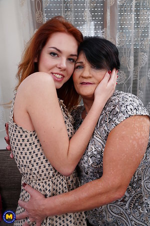 Naughty mature lady having fun with a hairy lesbian babe