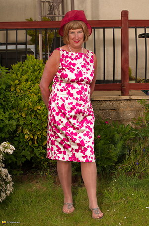 She opened the book  and she took the vibrator and began to caress her clitoris