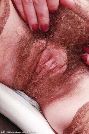 Throwing off her skirt she takes a banana and began to shove deep into his hairy pussy