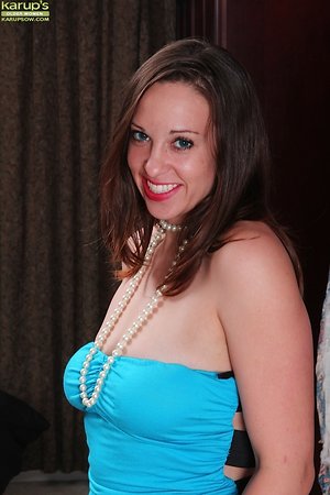 Mature frolics with beads lying on the floor in the HQ porn pics