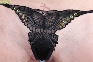 Short-haired mature bitch with dry body fucks herself with a sex toy