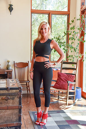 Free pics with full-breasted MILF lets man touch her tits