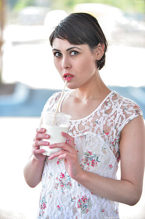 Beauty in floral dress bares body for small tits milf pics