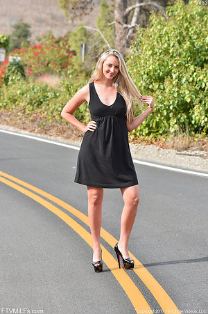 Porn pics of blonde girl flashing slender body on the road